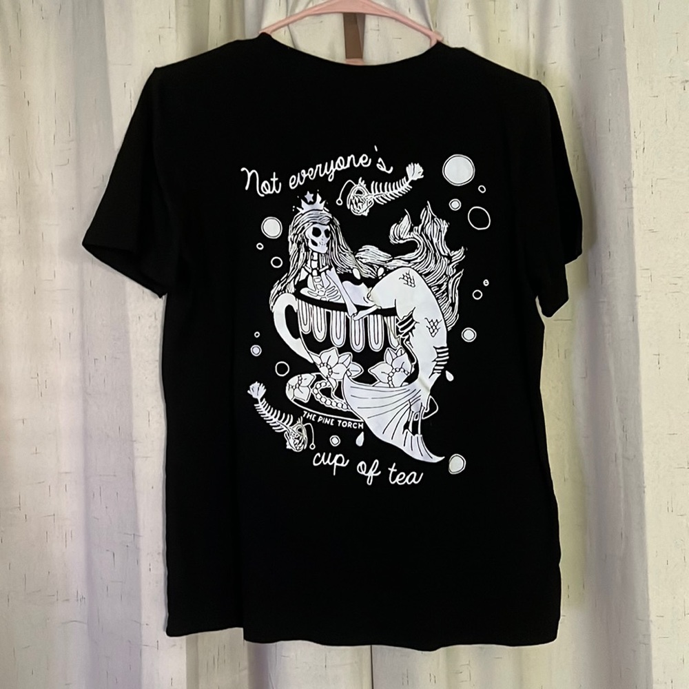Black t shirt “not everyone’s cup of tea”
